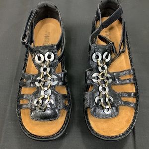 NAOT Women’s trovador wedge sandal.